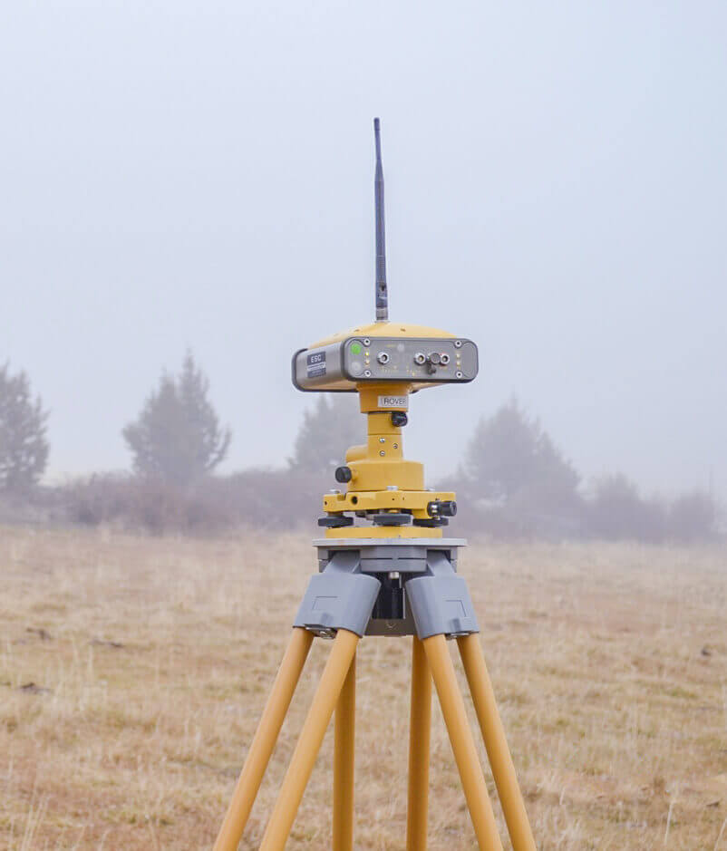 GPS surveying equipment on a tri-pod.